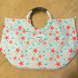 NWOT Swig Loopi Tote/pool bag. 16in wide,15in tall, 11in deep. Waterproof.